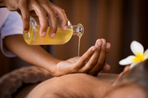 Ayurveda massage with warm herbal oils for relaxation and healing