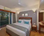 Spacious suite bedroom at Noah Sky Suites, a 4 star hotel near Kochi airport